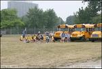School buses park in Piston Park